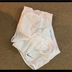 White Nike shorts